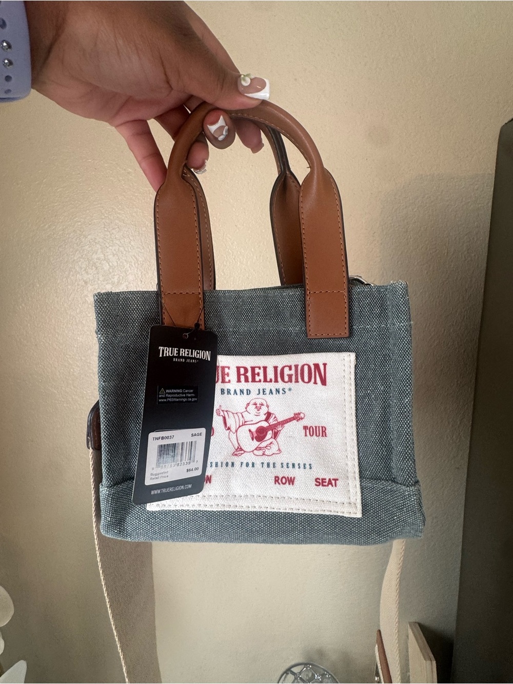True Religion gray denim tote with brown leather handles